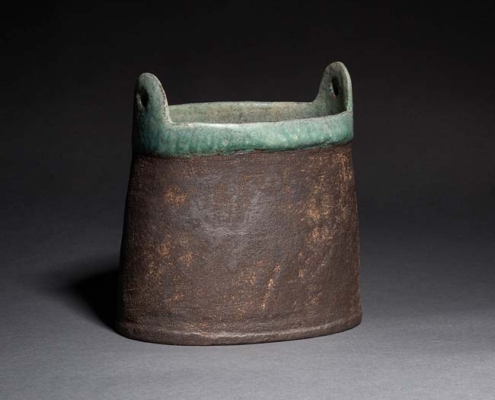 Stoneware vessel with lugs